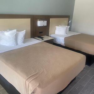Quadruple Room Two Queen Beds Pool View Non Smoking